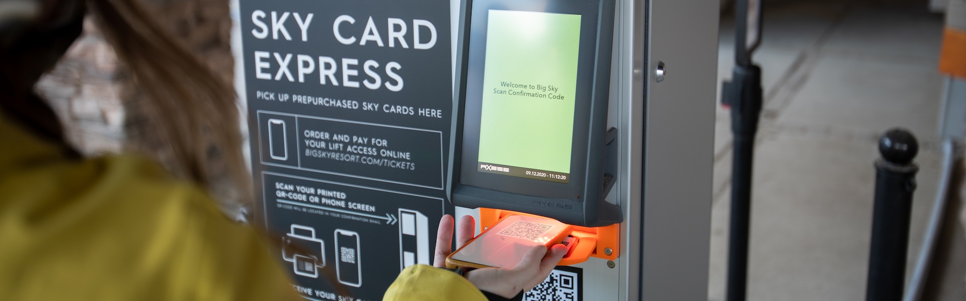Scanning a phone to print Sky Cards at our Sky Card Express Stations